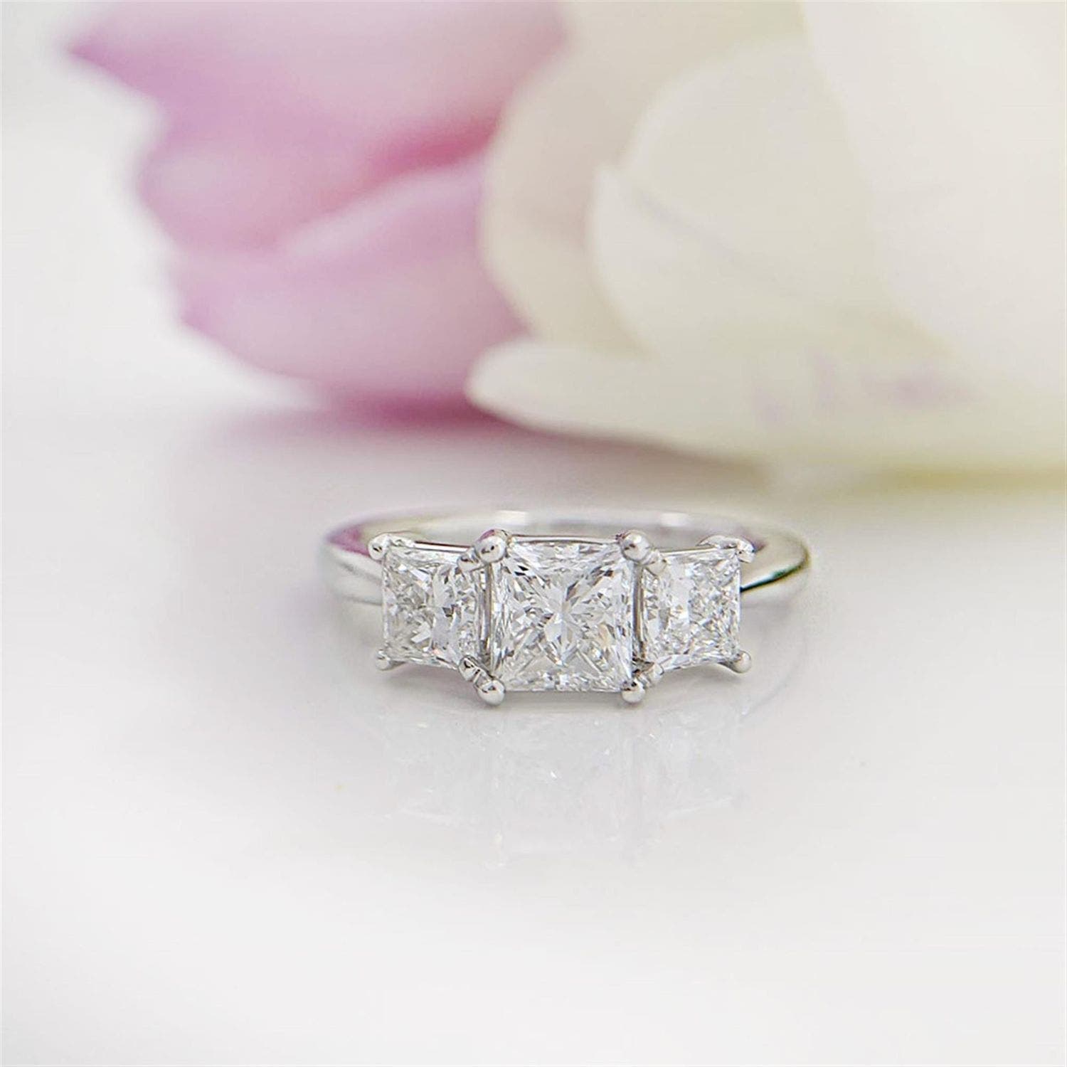 View Three Stone Engagement Rings